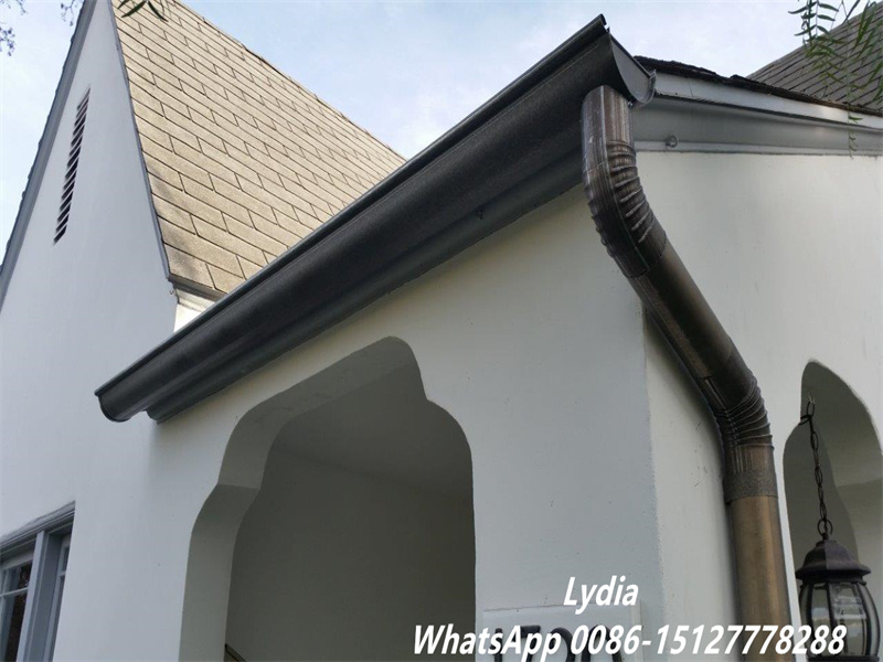 Round downspout drainage system for residential and commercial buildings