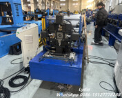 downspout roll forming machine with exit shear cutting system