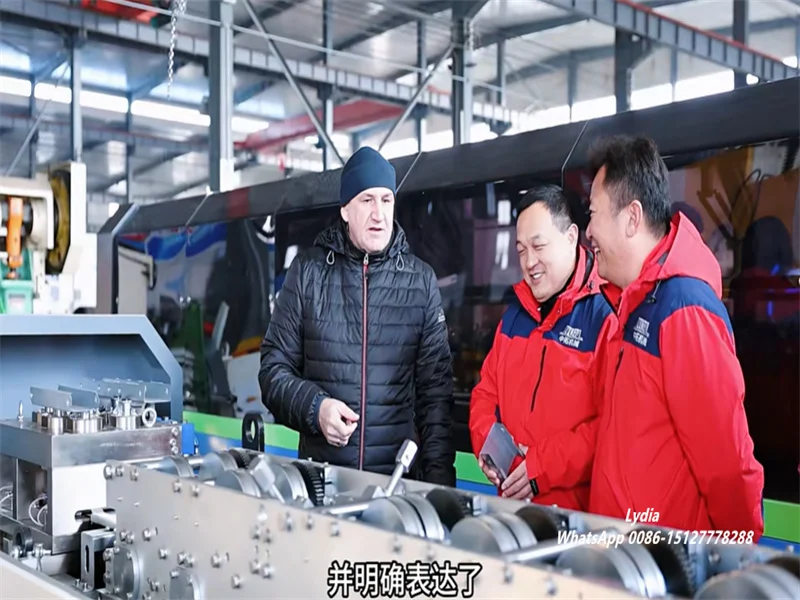 Good News-Russian Industry Expert Praises Zhongtuo Roll Forming, Signals Long-Term Cooperation 4 Russian client inspecting roll forming machines at Zhongtuo factory