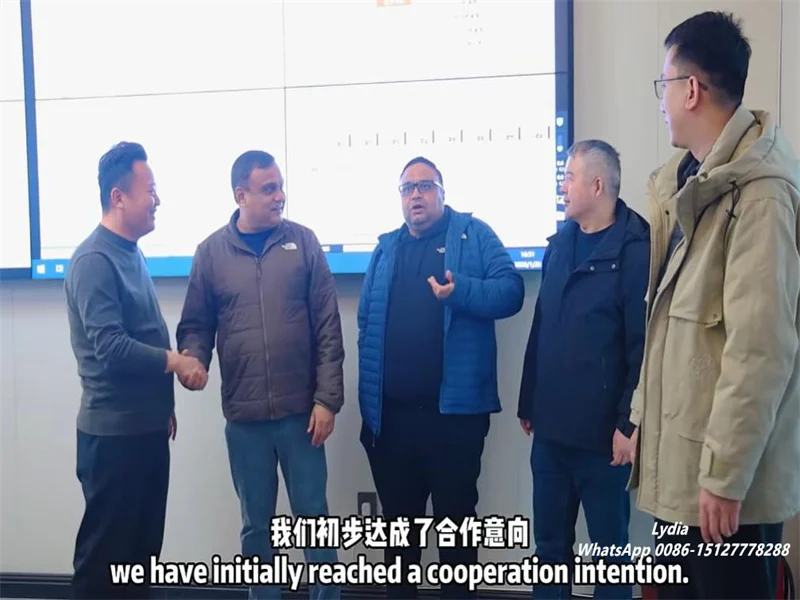 Zhongtuo engineers explaining garage door roll forming system to U.S. clients
