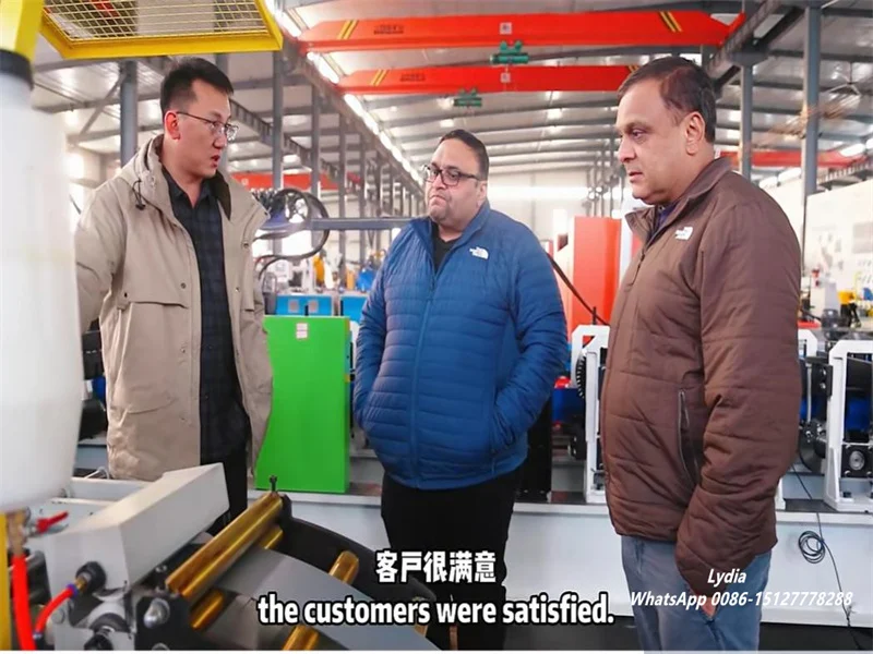Good News-Zhongtuo Receives Strong Positive Feedback from U.S. Customers on Garage Door Roll Forming Machine 2 On-site evaluation of garage door roll forming equipment by U.S. buyers