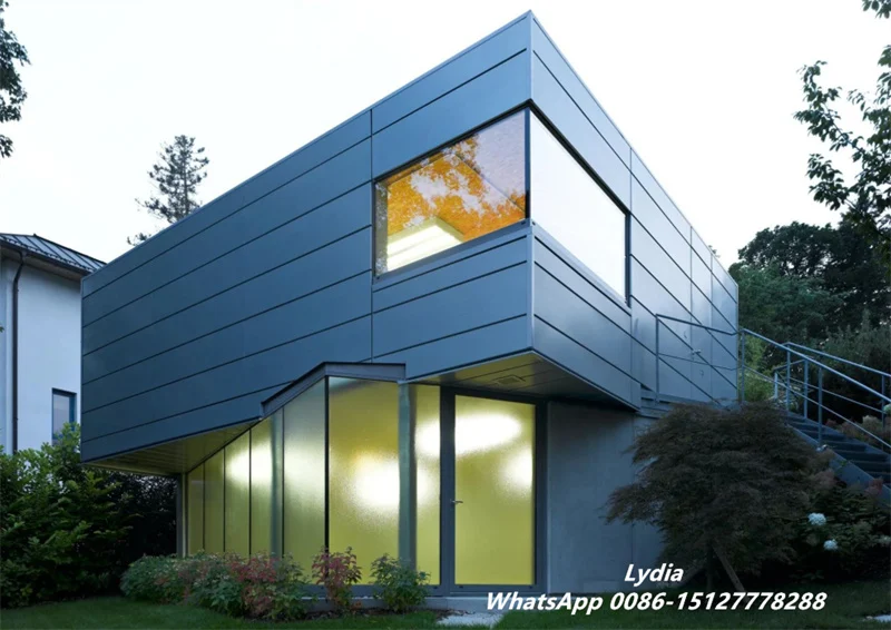 Architectural metal cassette rainscreen facade installed on commercial building exterior